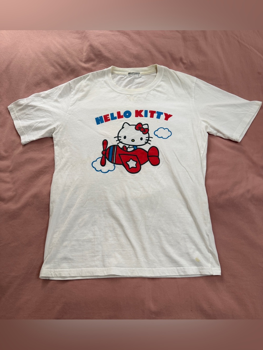 Hello Kitty White Tee with Red & Blue Airplane Graphic